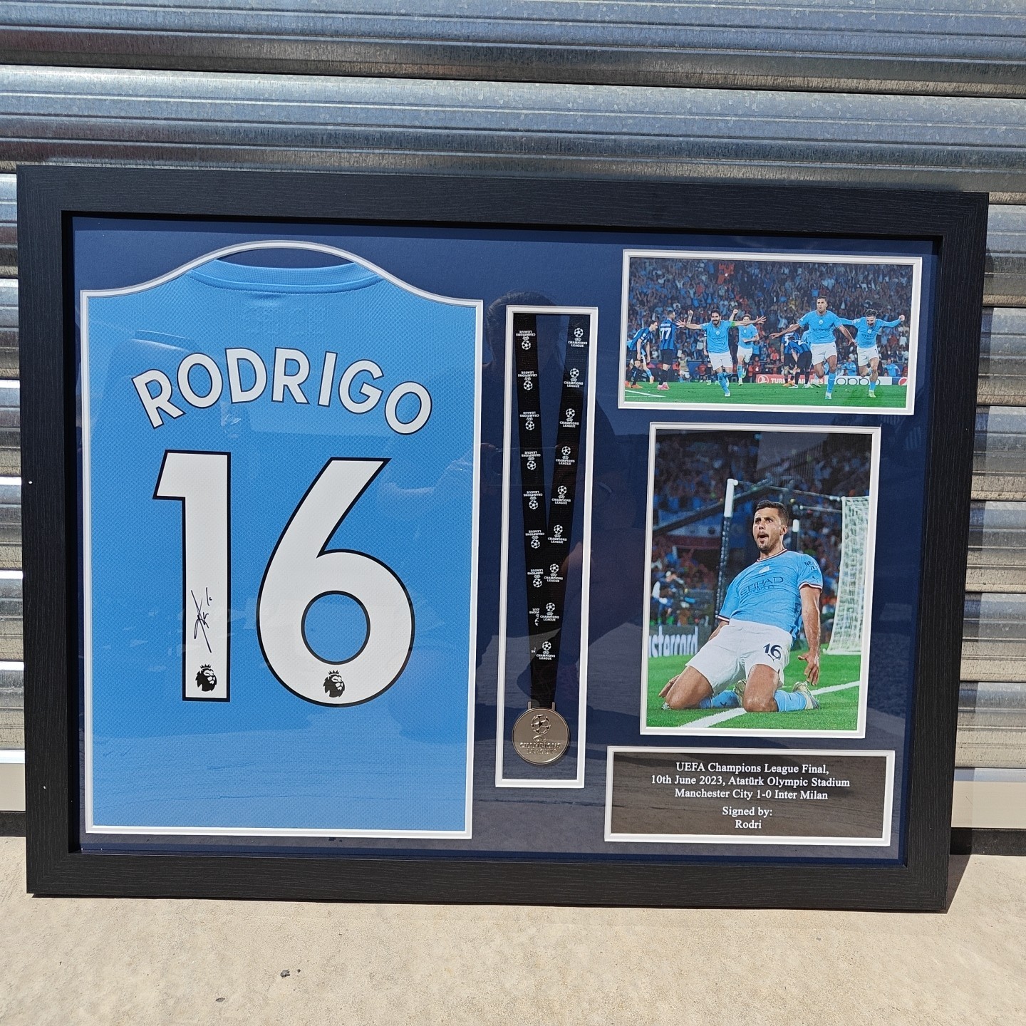 A FRAMED,SIGNED MANCHESTER CITY FC RODRI SHIRT ACCOMPANIED BY A UEFA CHAMPIONS M for sale on Ebay