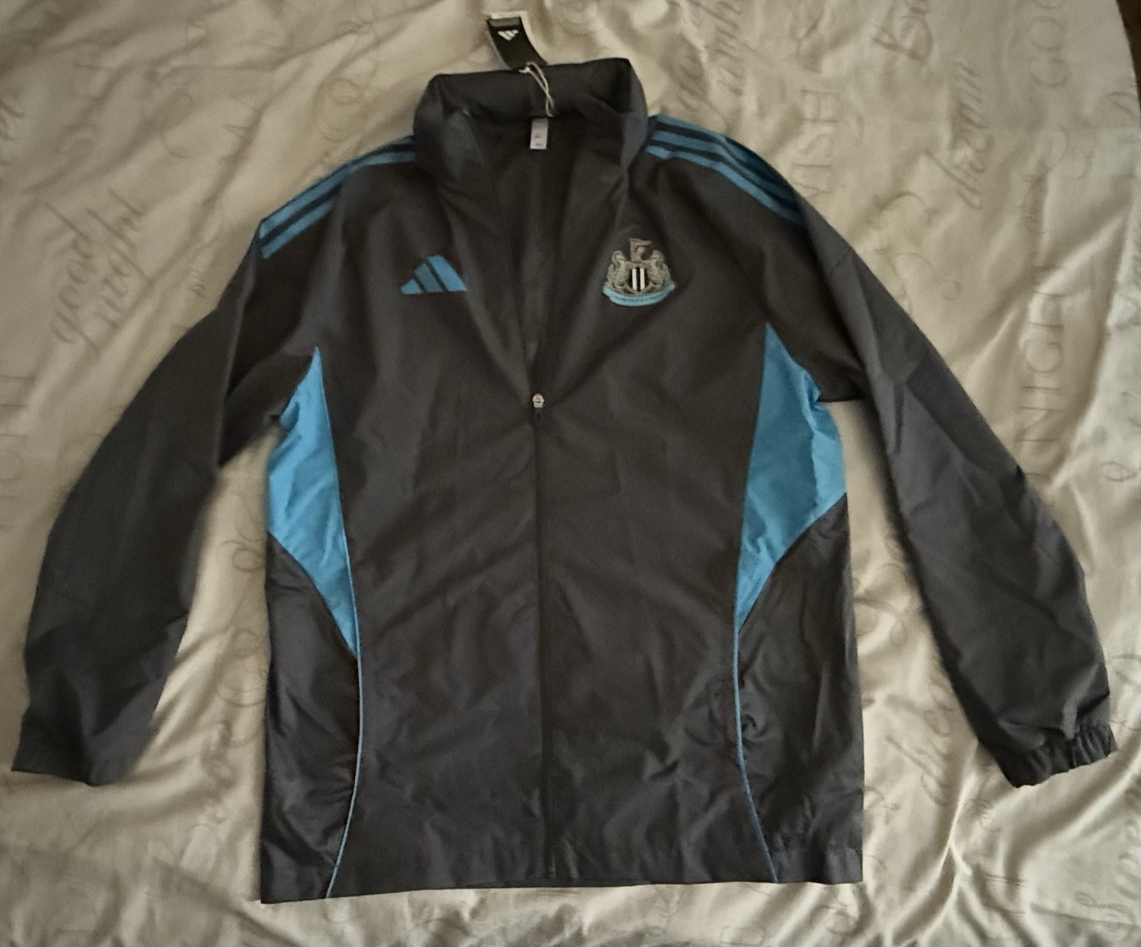 Newcastle United Players Range All Weather 25/26 Jacket Size M for sale on Ebay