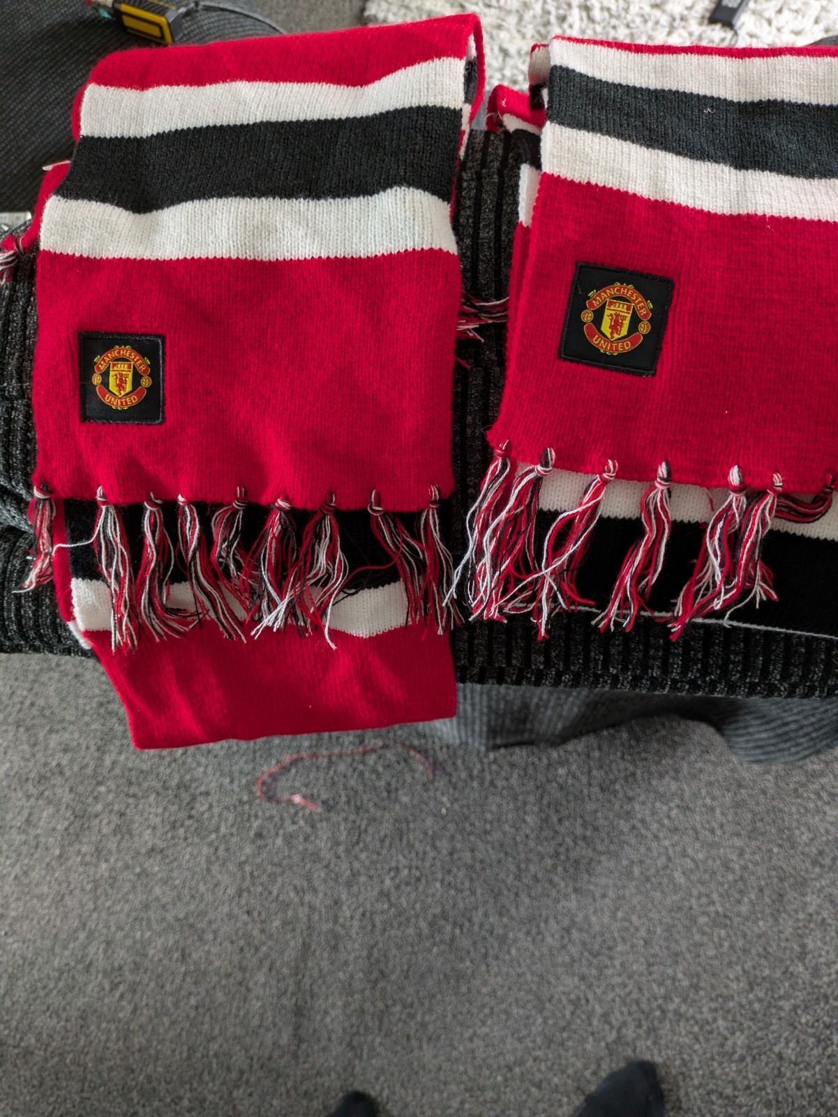 Two Man Utd Scarfs never worn  for sale on Ebay