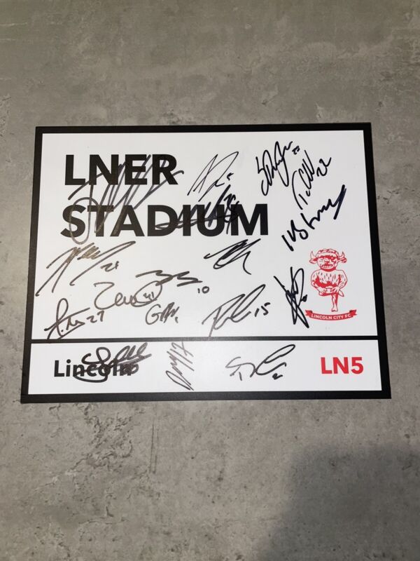 LINCOLN CITY SIGNED 2024 METAL STREET SIGN FOOTBALL SHIRT PROOF PHOTO 1 for sale on Ebay