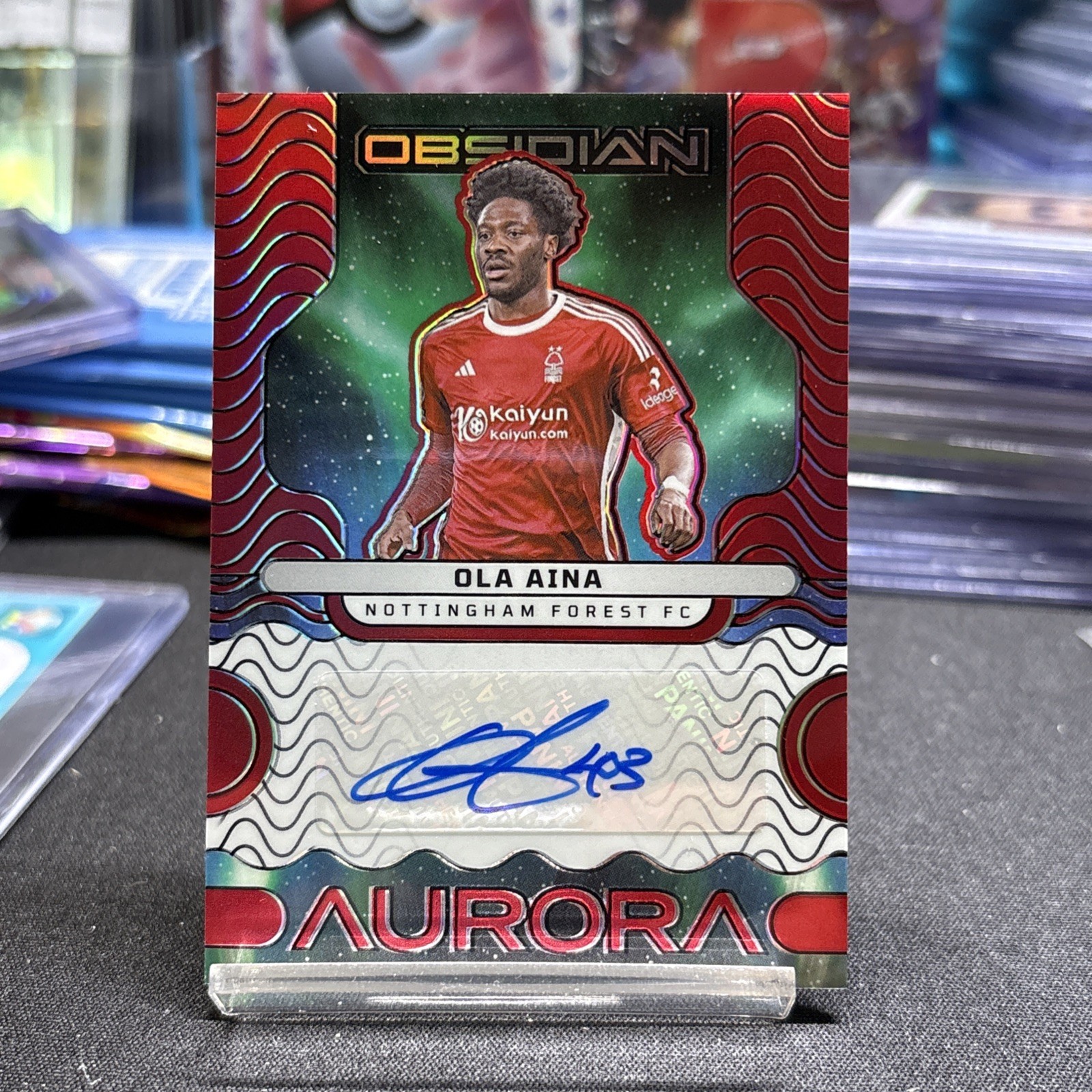 Ola Aina 2023-24 Panini Obsidian Aurora Auto #/10 Nottingham Forest RED for sale on Ebay