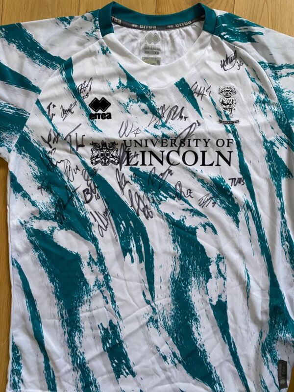 Lincoln City FC 22/23 squad signed  third shirt  for sale on Ebay