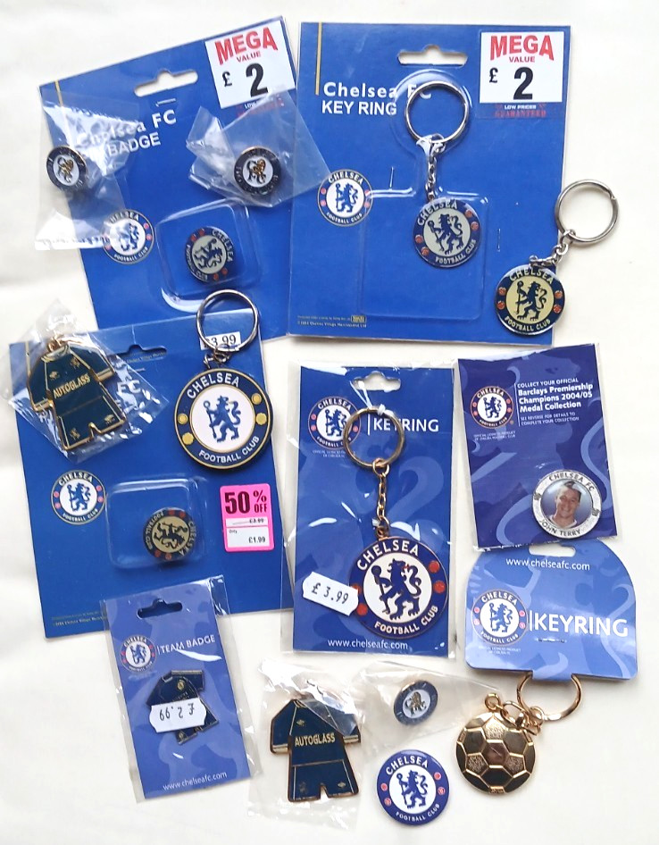 Box of Chelsea memorabilia. Season tickets, pin badges, key rings, pens, etc,. for sale on Ebay