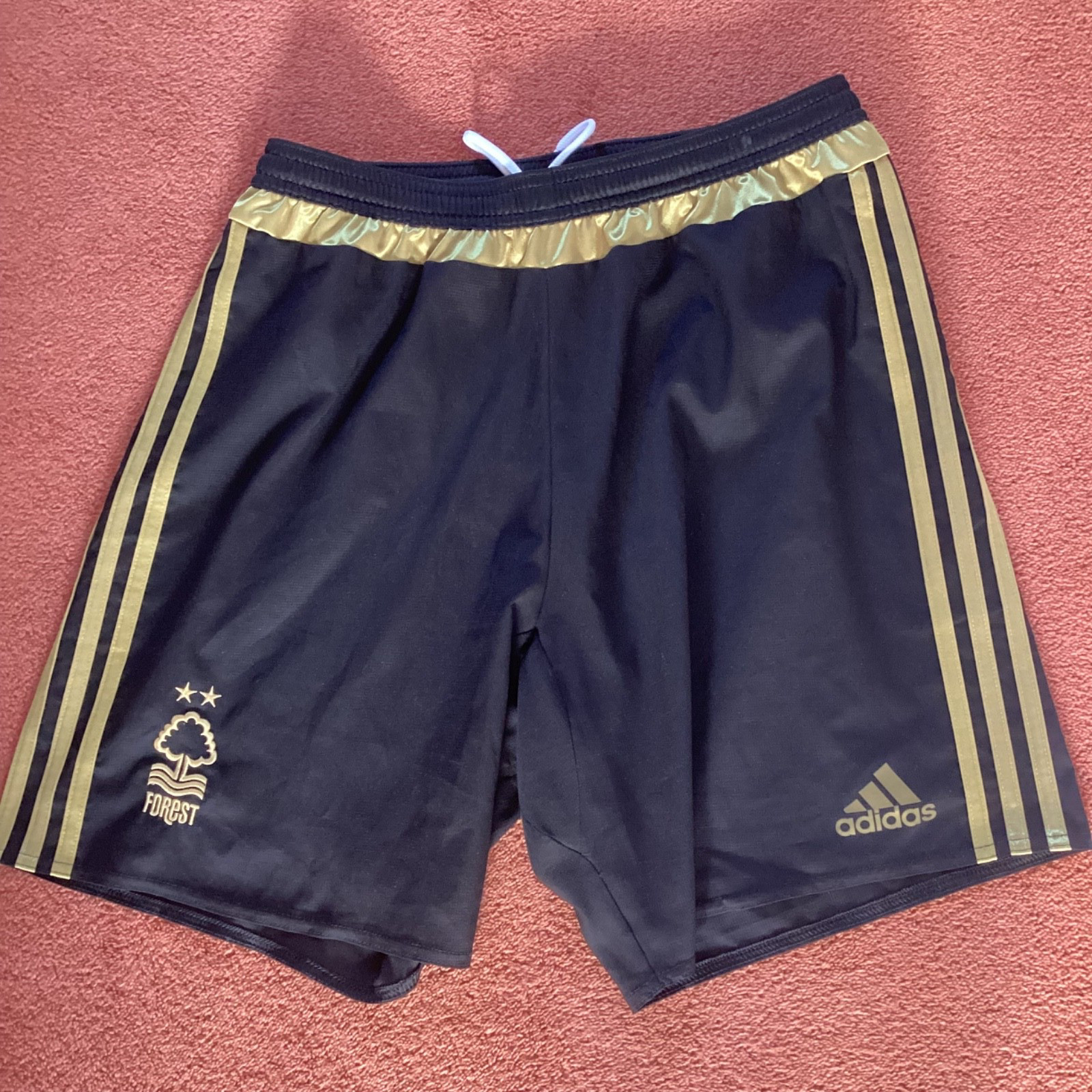 NOTTINGHAM FOREST BLACK WITH GOLD TRIM SHORTS SIZE M for sale on Ebay