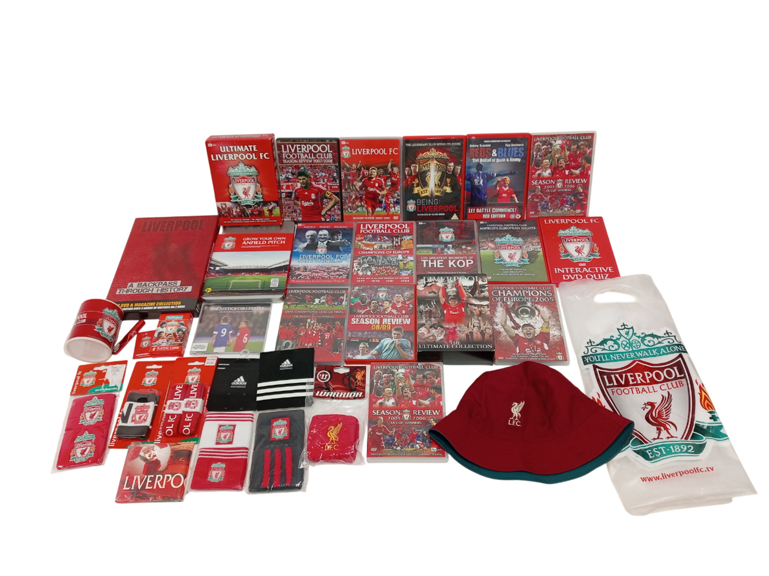 Liverpool Football Club Huge Bundle DVDs, Hat, Mug, Wrist Bands and More for sale on Ebay
