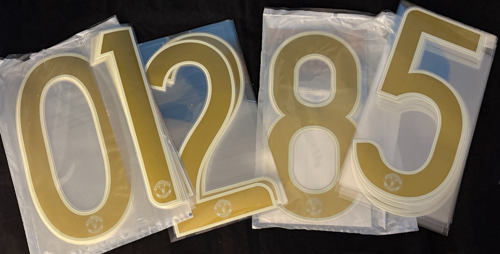 Official Sporting ID 2006-07 Gold Manchester United Number UCL x 50 joblot for sale on Ebay