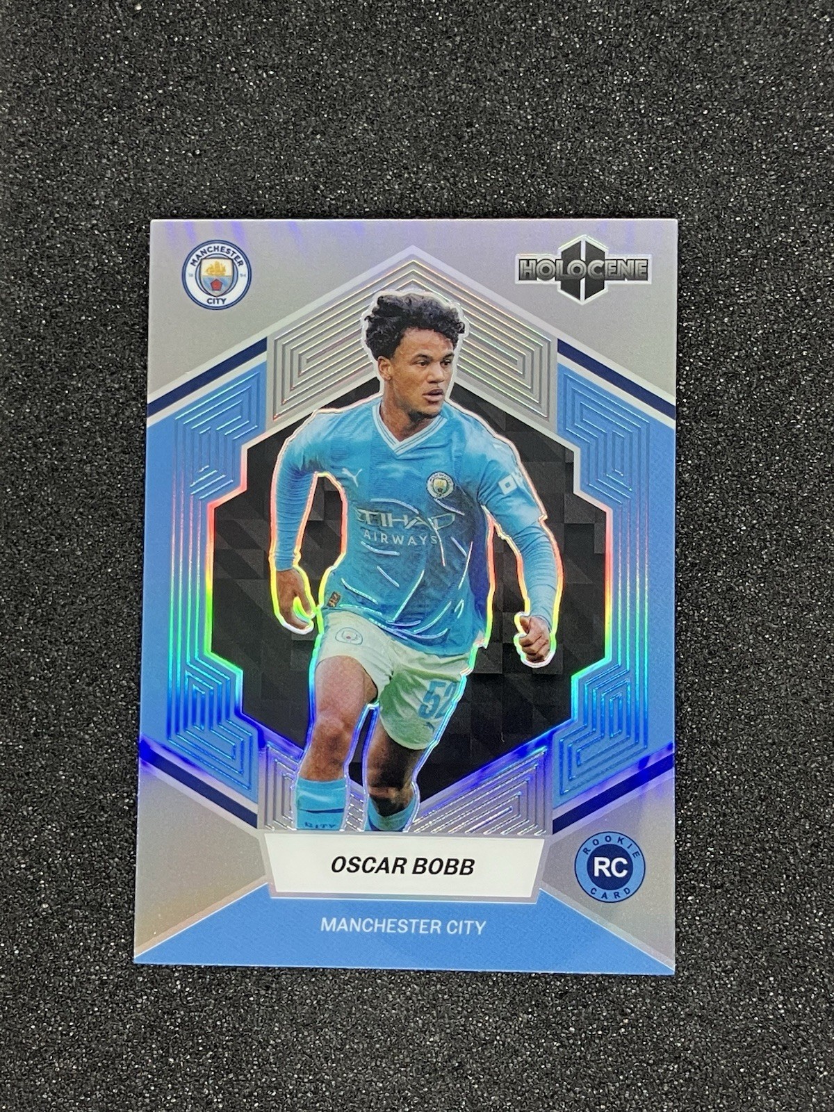 2023-24 Daka Holocene Manchester City Oscar Bobb /99 Rookie Silver Base Parallel for sale on Ebay