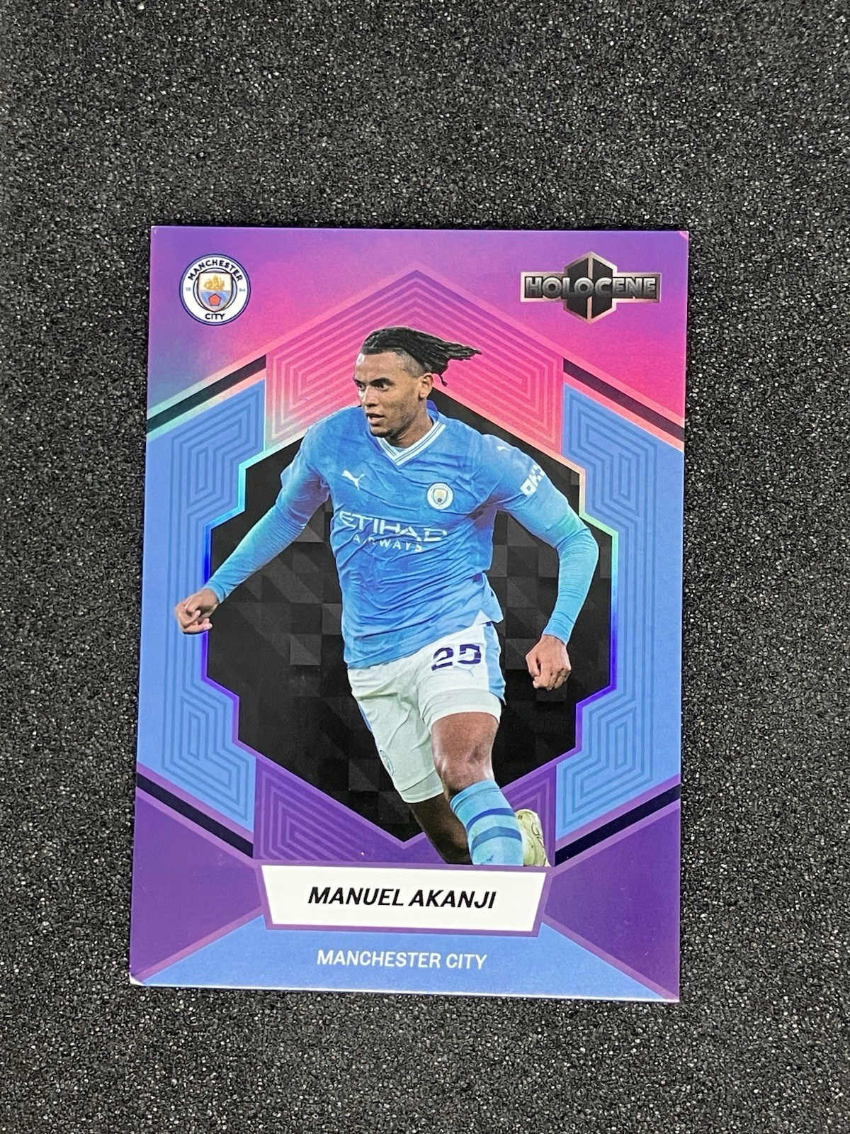 2023-24 Daka Holocene Manchester City Manuel Akanji /99 Purple Base Parallel for sale on Ebay