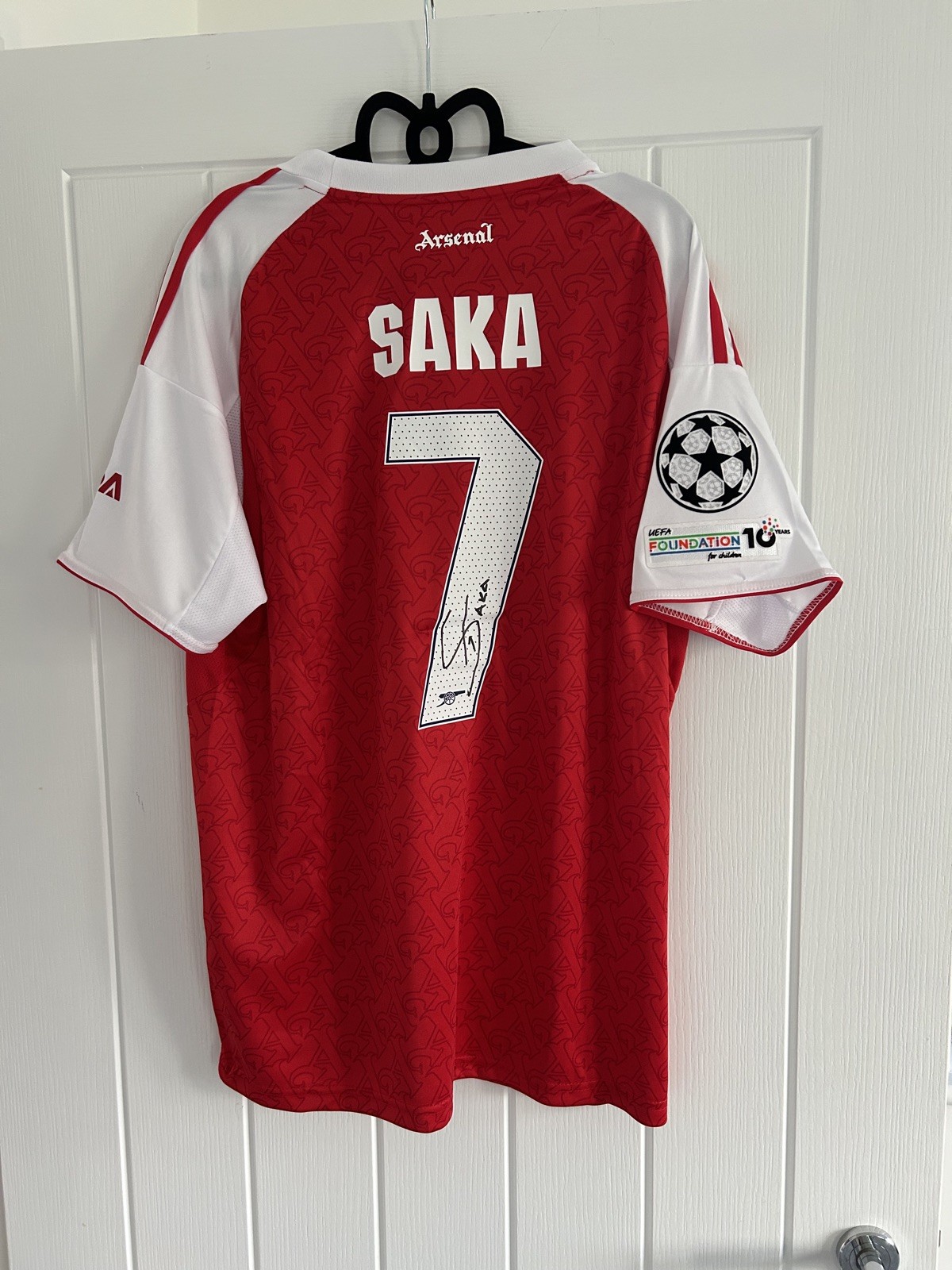 Hand signed Bukayo Saka Arsenal Shirt for sale on Ebay